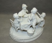 Скульптура фарфоровая старинная Дети за столом (W332)